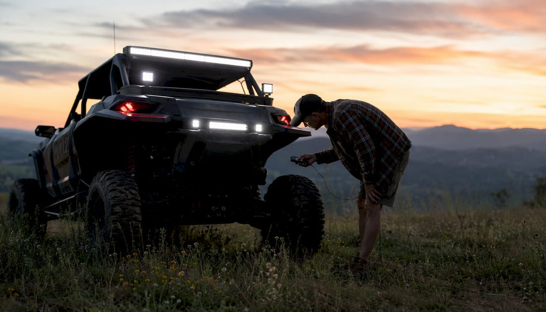 Pickup truck with off-road lighting at dusk