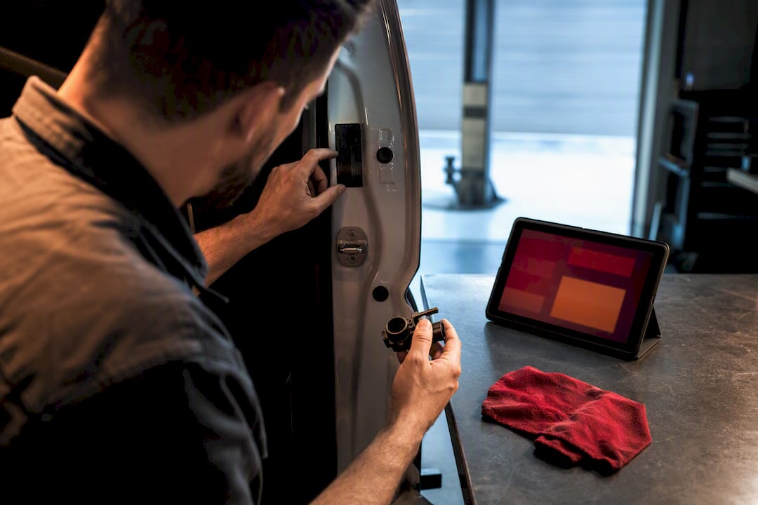 Specialist verifying VIN against OEM part