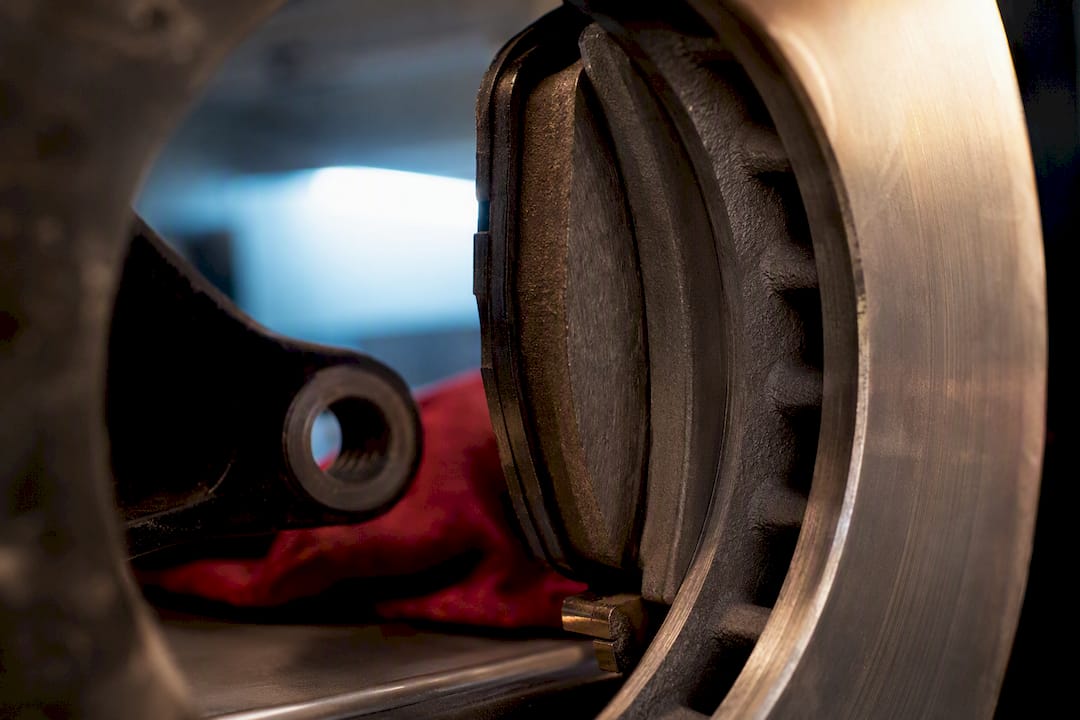 Brake pad friction material against rotor