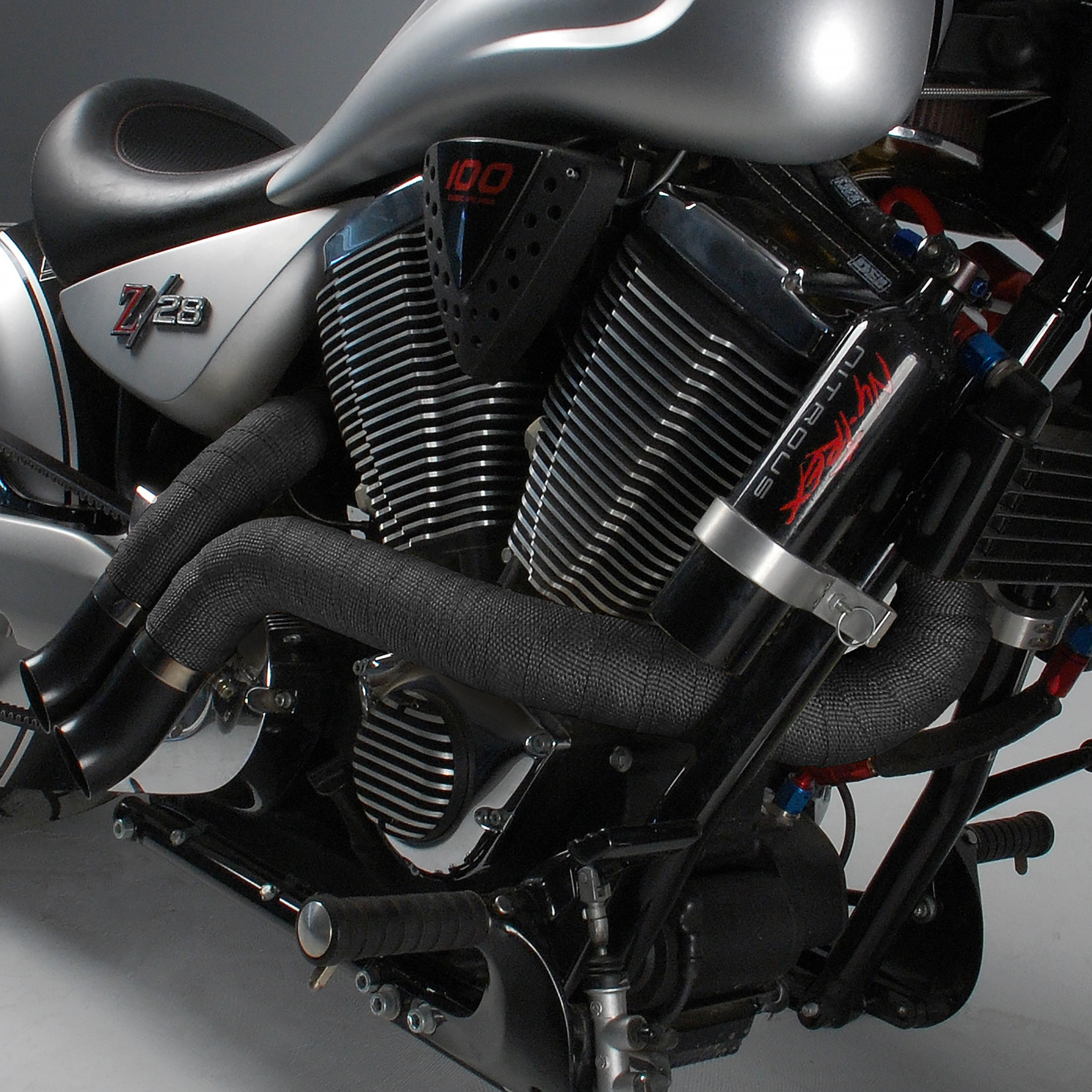 Design Engineering One can of high-temp silicone coating in black. Engine Paint 10301
