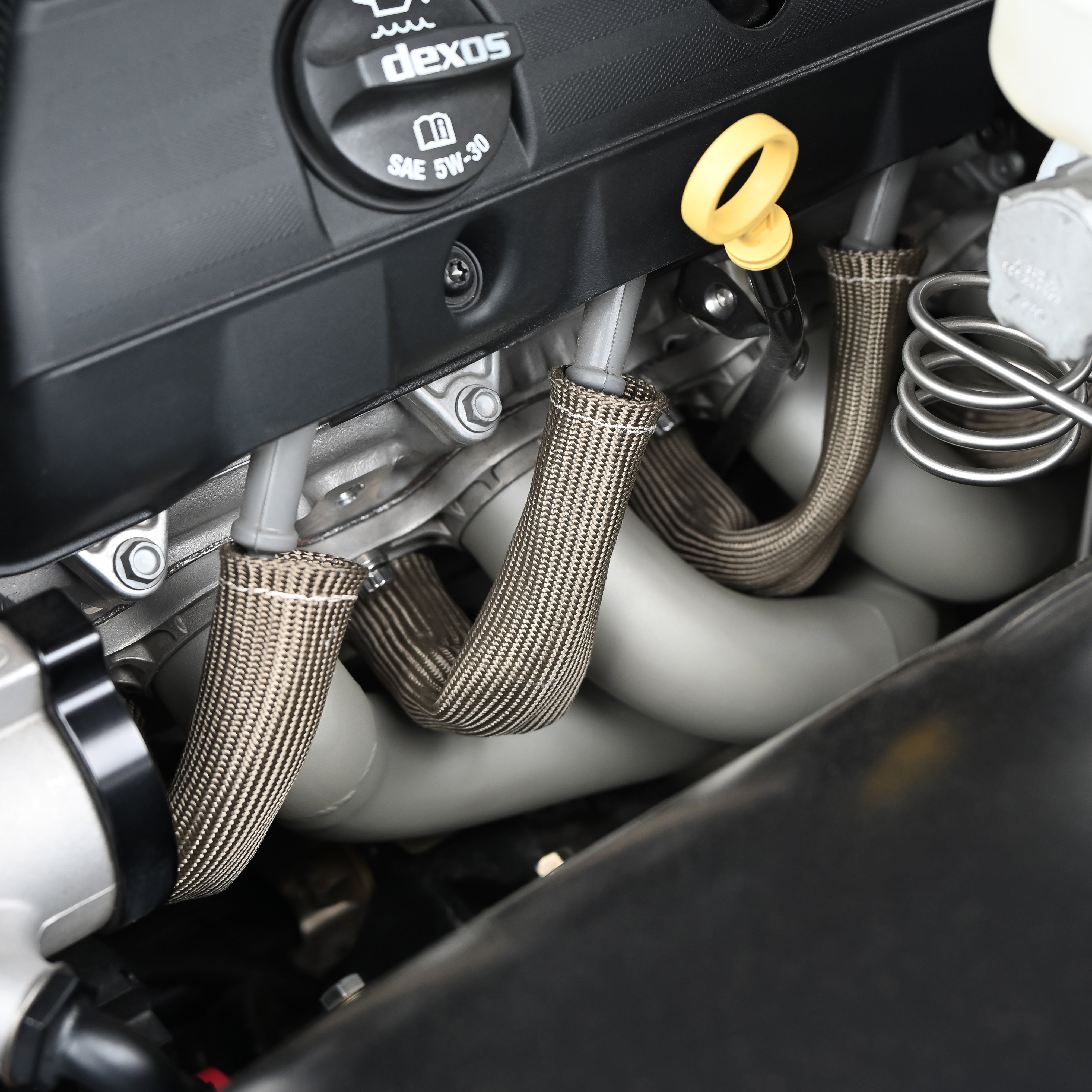 Design Engineering Eight 6 inch Titanium Protect-A-Boots with internal metal ring. Spark Plug Boot Heat Sleeve