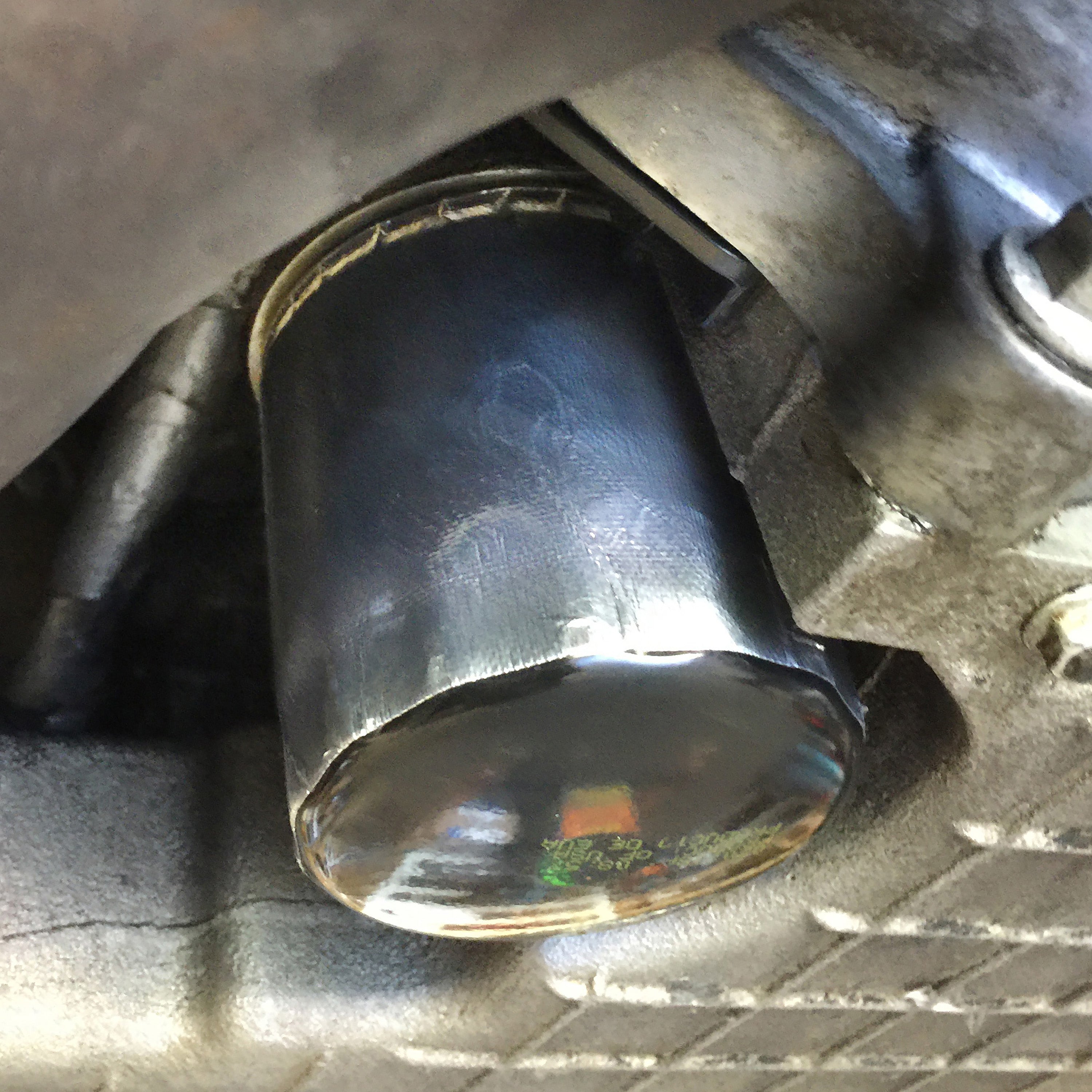 Design Engineering Three 3-1/2 to 4-1/2 inch by 4 inch oil filter reflective shields. Exhaust Heat Shield